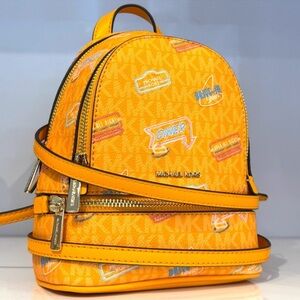 Michael Kors Rhea Extra-Small Printed Signature Logo Backpack Pop Orange